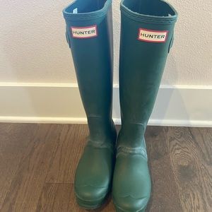 Tall dark green Hunter boots